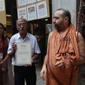 Sri P.S. Seshadri displaying the National Record citation to His Holiness